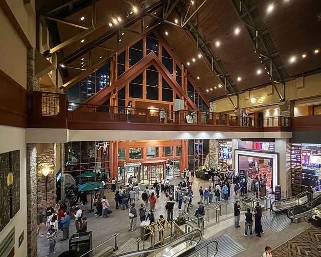 The timber-framed atrium lobby of River Rock Casino Resort, with the gaming floor entrance on the right